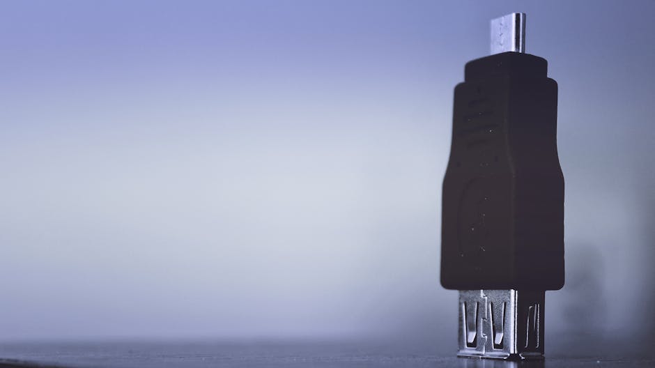 Detailed shot of a USB connector with a minimalist and modern aesthetic, emphasizing technology.