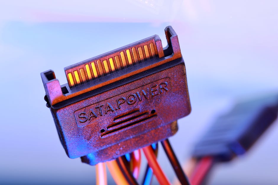 Detailed view of a SATA power cable connector with colorful wiring.