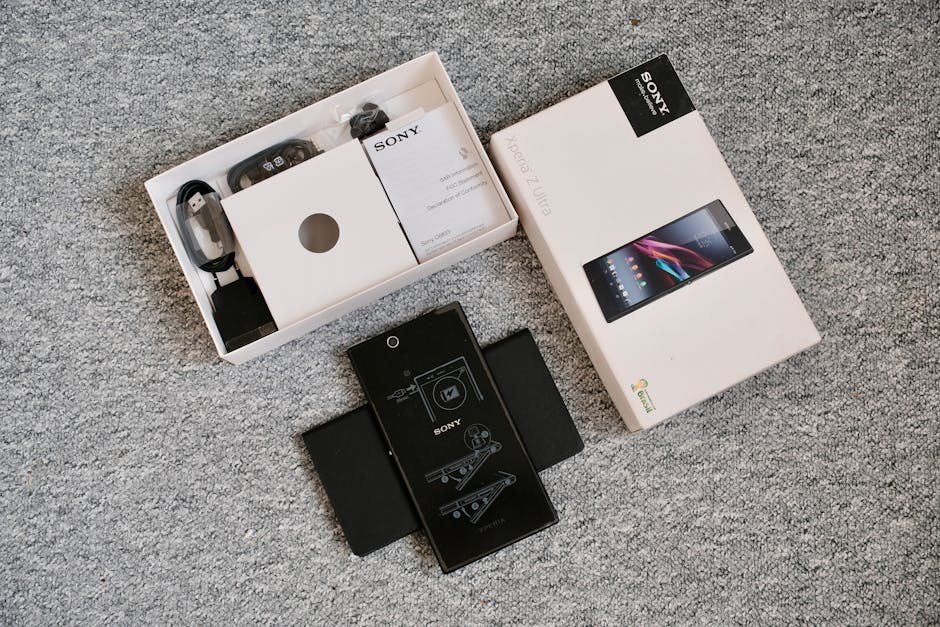 Detailed unboxing image of a mobile phone and its accessories, perfect for tech blogs.