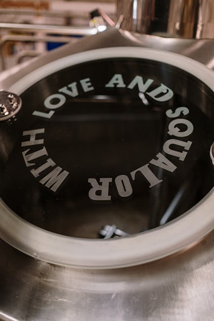 Detailed view of machinery featuring 'Love and Squalor' text, industrial setting.