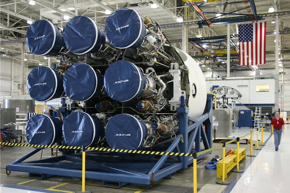 A detailed look at SpaceX rocket assembly in an advanced industrial facility with engineering equipment.