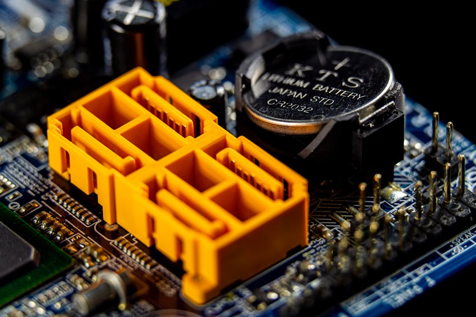 Close-up view of a motherboard with visible electronic components and connectors. Close-up view of a motherboard with visible electronic components and connectors.