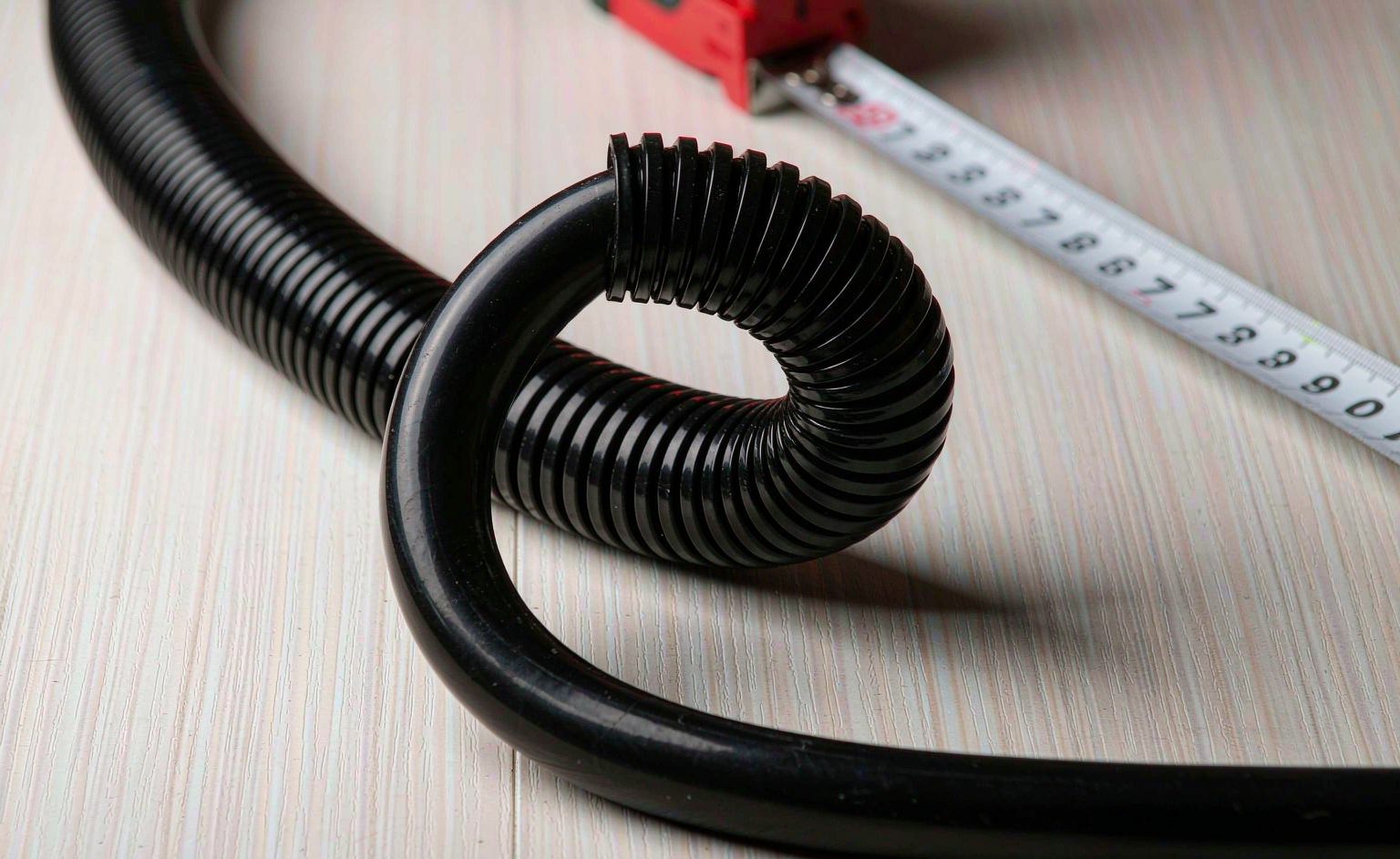 Close-up of cable bend radius measurement against a cable outer diameter